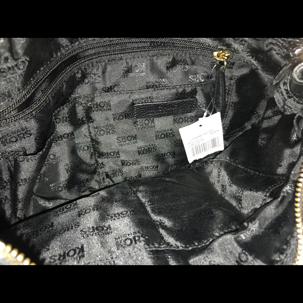Michael Kors black leather tassel purse. Nwt
